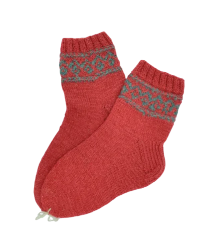 Hand-knitted wool socks in red, made from naturally dyed wool and crafted in small batches