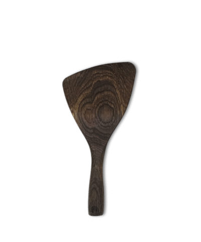 Hand-carved smoked oak mini spatula with curved edge and smooth finish.