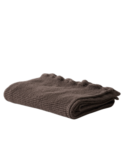 Organic Cotton Waffle Bath Towel - Brown folded on a transparent background