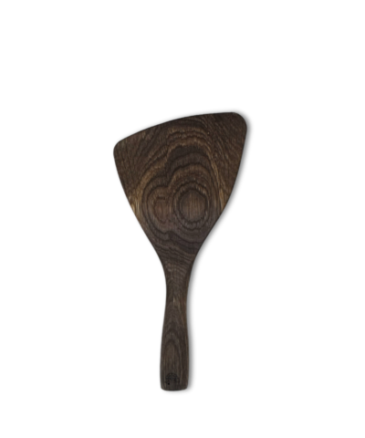 Hand-carved smoked oak mini spatula with curved edge and smooth finish.
