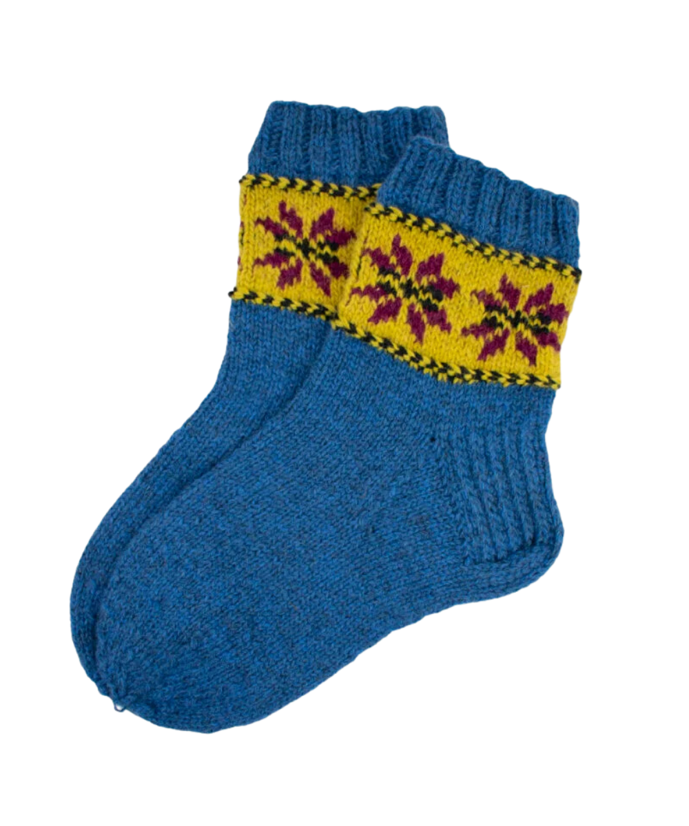 Hand-knitted wool socks made from sustainably sourced Latvian wool, naturally dyed and crafted in Europe.